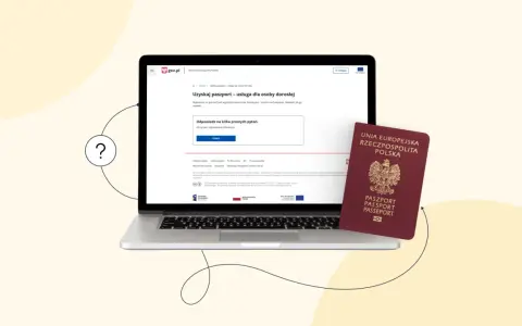 Czy mozna wyrobic paszport online? Na laptopie widzimy stronę gov.pl z informacją o uzyskaniu paszportu. Obok leży polski paszport.